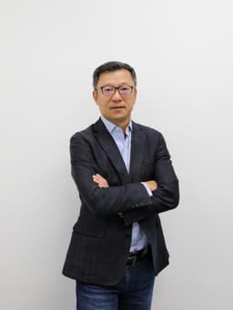 Xigang Tang